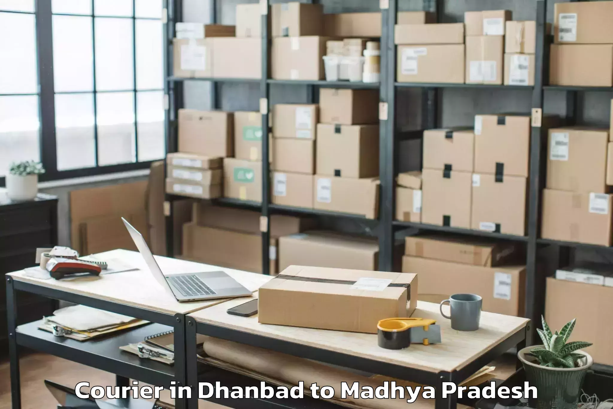 Book Your Dhanbad to Manpur Courier Today